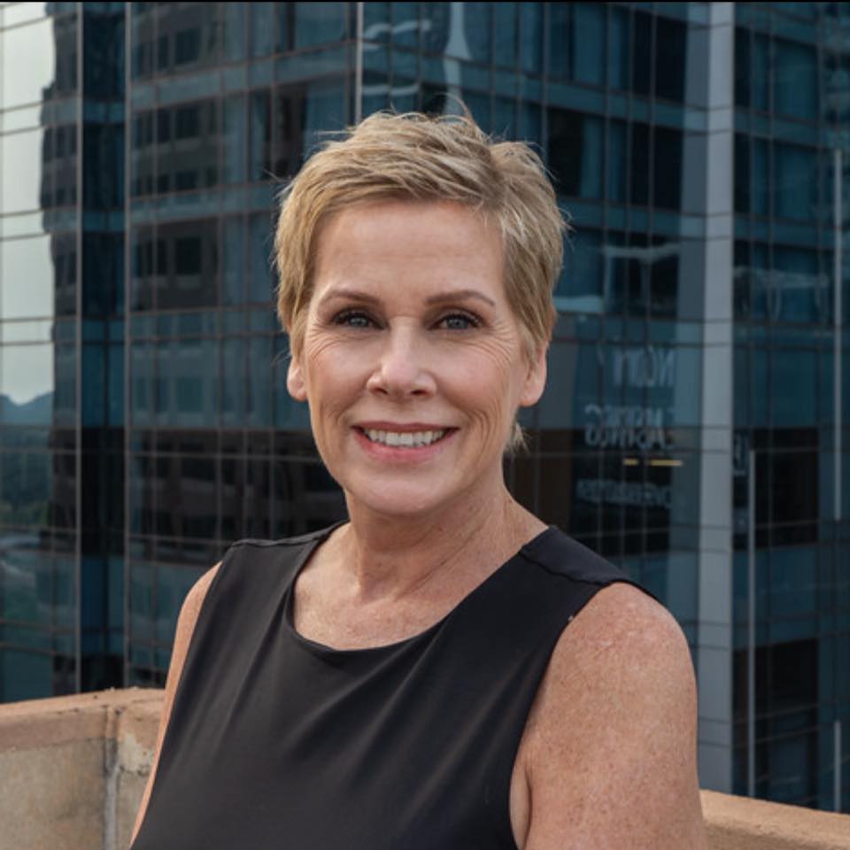 Stephanie Sharp helping a client in Austin
